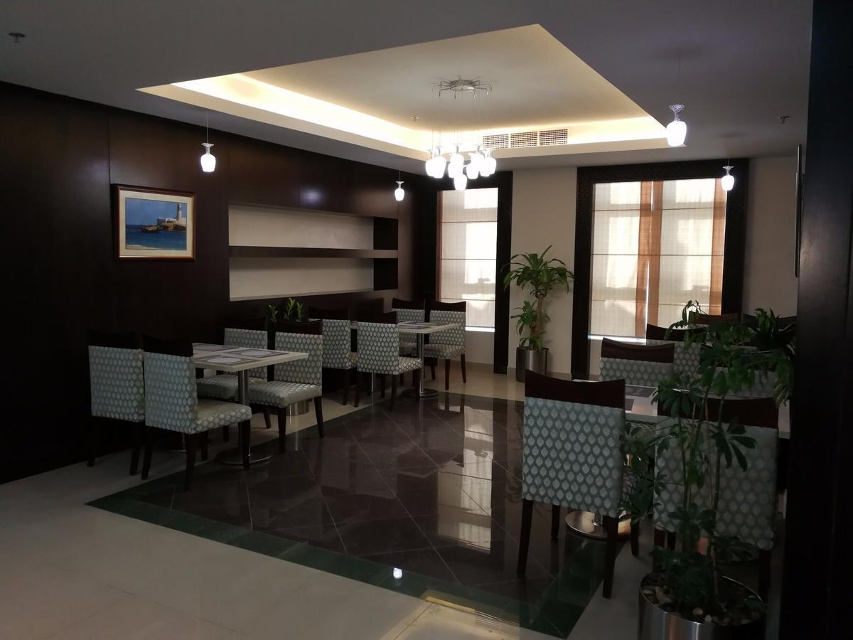 Golden Tulip Headington Hotel Maszkat Kültér fotó